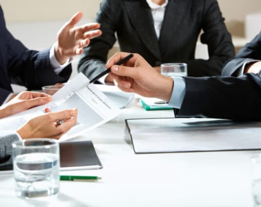 Roswell IT consulting with a client on their business needs